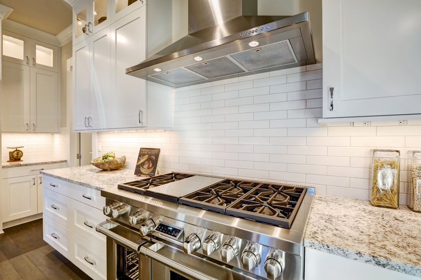 A Picture of a Beautiful Kitchen with a New Subway Tile Backsplash.