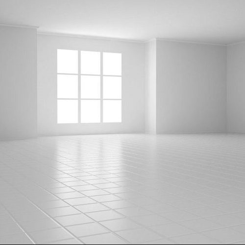 A Picture of an Empty White Room with Square Windows and a Tiled Floor.