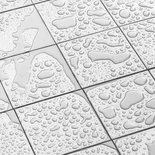 A Picture of Wet Floor Tiles.